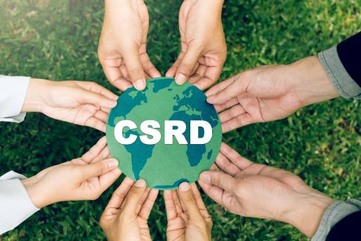 8 dłoni trzymających koło z napisem CSRD